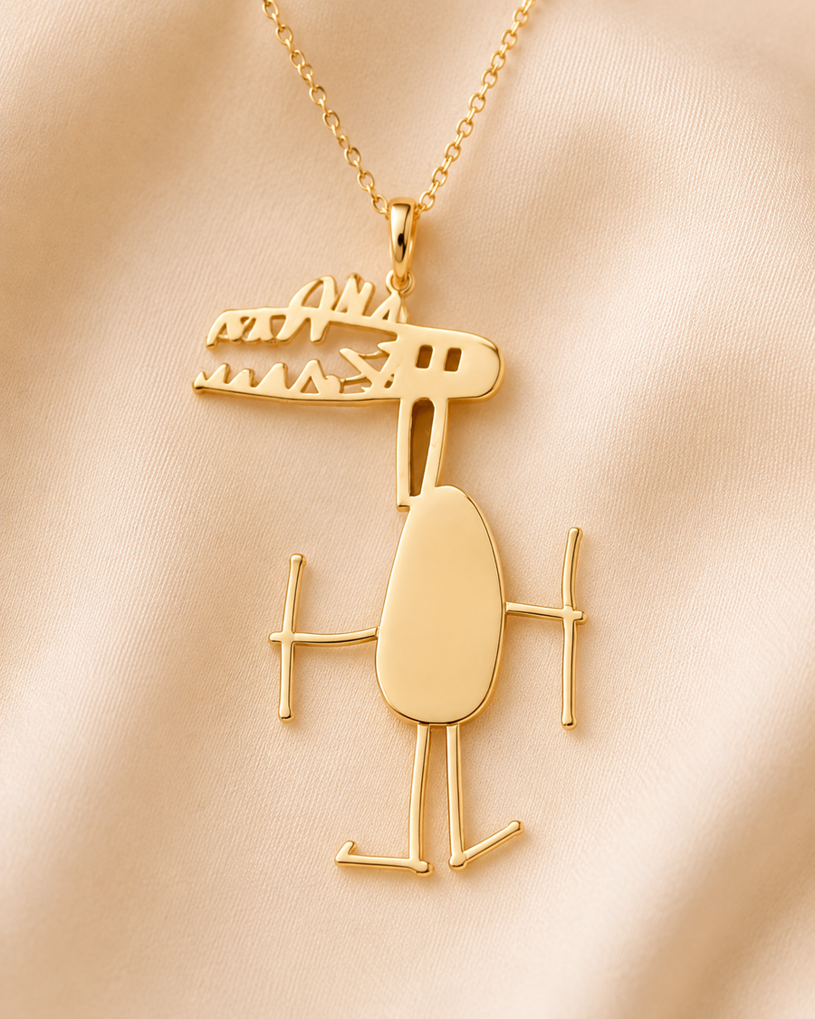 Gouden ketting met De Oranje Dino uit Noahs schetsboek