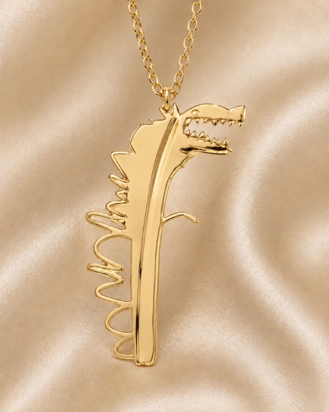 Gouden ketting met De Lange Dino uit Noahs schetsboek